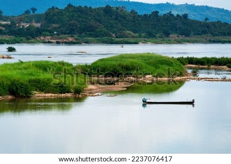 Scenery of the Kong river, known as the Xe Kong or the Se Kong, a river in Southeast Asia. The river originates in Thua Thien–Hue Province in Central Vietnam and flows 480 kilometre, Sangkhom district Royalty-Free Stock Photo #2237076417