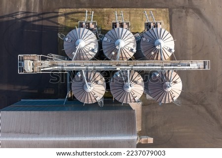 aerial view of a huge agro-industrial complex with silos and grain drying line