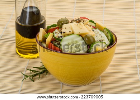 Greek salad with olive oil and vinegar