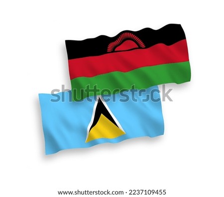 National vector fabric wave flags of Saint Lucia and Malawi isolated on white background. 1 to 2 proportion.
