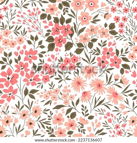 Beautiful floral pattern in small flowers. Small rose pink flowers. White background. Ditsy print. Floral seamless background. Elegant template for fashion prints. Stock pattern.