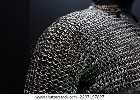 Close-up view of real handmade chainmail armor. Details of armor chain texture. Royalty-Free Stock Photo #2237157697