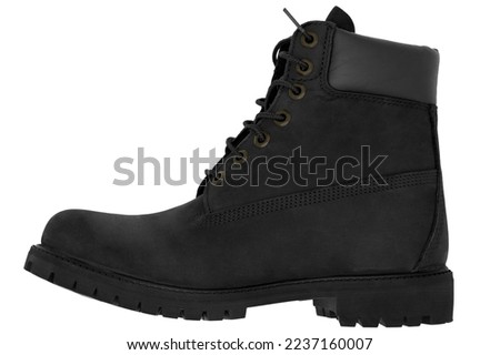 Man black leather boot on white background