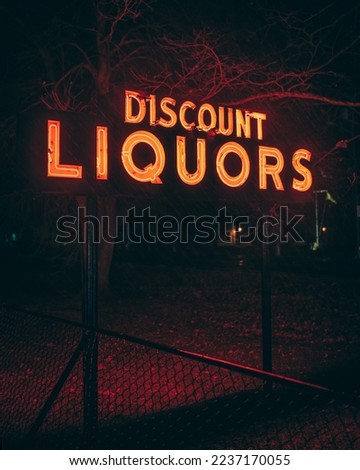 Discount liquors neon sign at night, Amagansett, New York