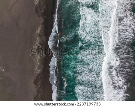 Aerial shot of the pacific ocean at Pichilemu, Chile 