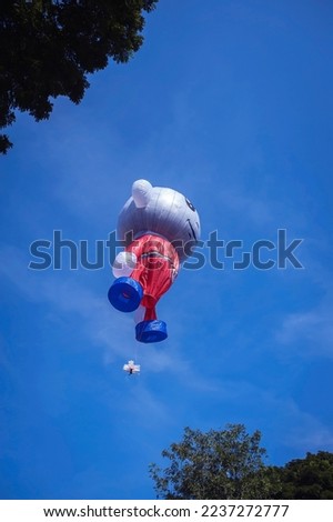 Balloons made of colorful paper filled with hot air inside are released into the sky.