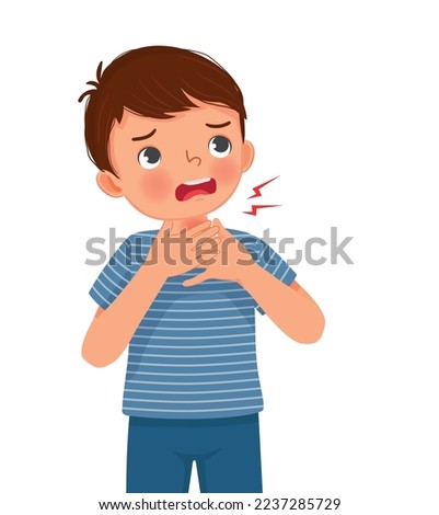 cute little boy suffering from sore throat touching his swelling and painful neck as symptoms of flu and allergy
 Royalty-Free Stock Photo #2237285729