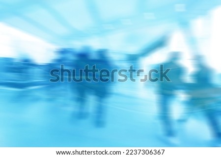 group of people movement blurred light background inside
