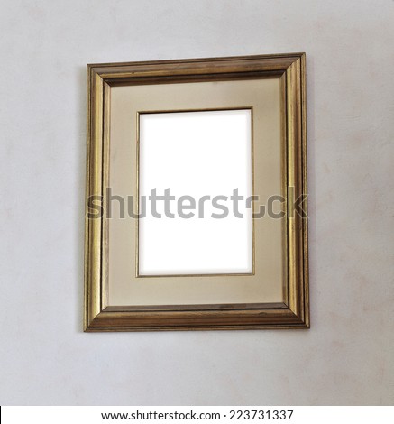 Blank picture frame on white wall, ideal for replacing with some creative art.