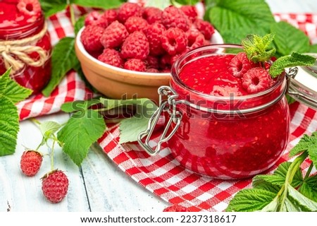 Organic raspberries, Fresh raspberries in bowl. Ripe juicy fresh raspberries. healthy food, vitamins, summer berry fruit. Long banner format. place for text,