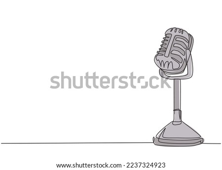 One single line drawing of retro old classic radio microphone for broadcasting. Vintage loudspeaker announcer item concept continuous line draw design vector graphic illustration