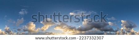 Dark blue sunset sky panorama with Cumulus clouds. Seamless hdr pano in spherical equirectangular format. Complete zenith for 3D visualization, game and sky replacement for aerial drone 360 panoramas. Royalty-Free Stock Photo #2237332307