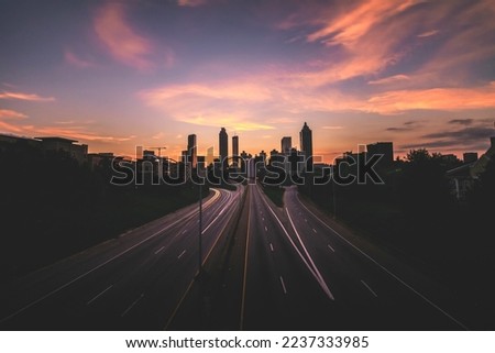 sunset from Jackson Street Bridge in Atlanta Georgia  with light trails