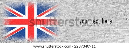 Flag of Britain. Flag is painted on a cement wall. Cement background. Plastered surface. Copy space. Textured creative background