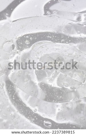 
Gel serum texture clear liquid skincare cream background cosmetic gel product with bubbles Royalty-Free Stock Photo #2237389815