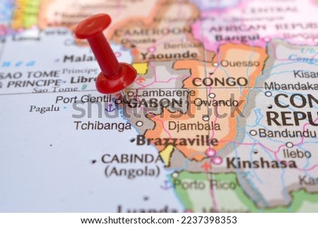 Red Push Pin Pointing on Gabon Country Name On The Political World Map Close-Up View Stock Photograph Royalty-Free Stock Photo #2237398353