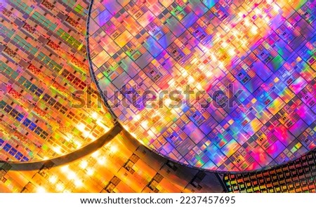 Silicon Wafers and Microcircuits,slice of semiconductor material, used in electronics for the fabrication of integrated circuits. Royalty-Free Stock Photo #2237457695