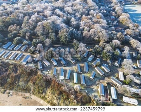 Drone view of seaside static caravans seen during mid winter. The homes are located on the Suffolk coast and are not occupied this time of year.