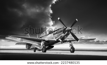 historical fighter plane on a runway Royalty-Free Stock Photo #2237480135