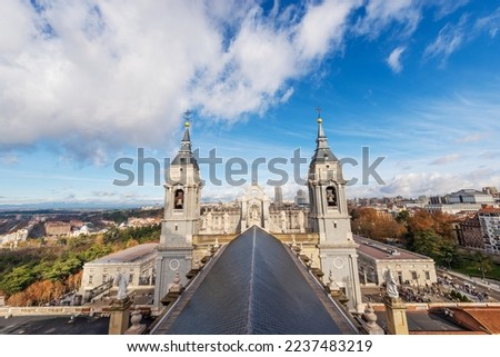 Madrid Royal Palace in Baroque style, in the past used as the residence of the King of Spain, and the Almudena Cathedral (Catedral de Santa Maria la Real de la Almudena). Plaza de la Armeria, Spain.