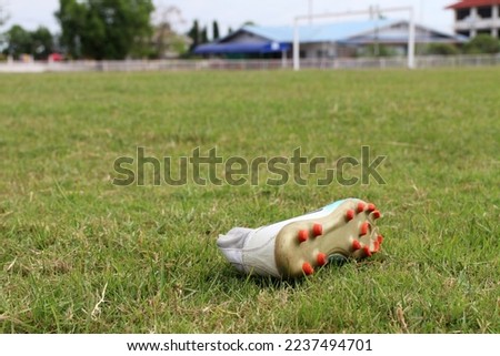 One football boot was forgotten on the football field.
