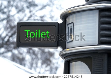 Sign of a public city toilet
