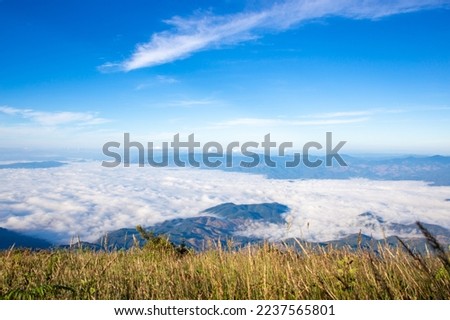 Beautiful misty sea view in the morning, large mountain ranges and sunlight , Kew Mae Pan Nature Trail ,Doi Inthanon National Park Thailand Royalty-Free Stock Photo #2237565801
