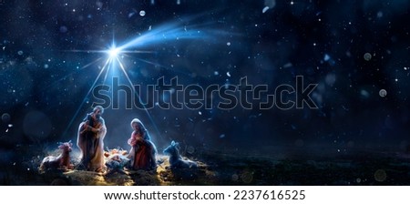 Nativity Of Jesus With Comet Star - Scene With The Holy Family In Snowy Night And Starry Sky - Abstract Defocused Background Royalty-Free Stock Photo #2237616525