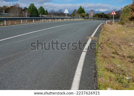 ground level view of a road curve