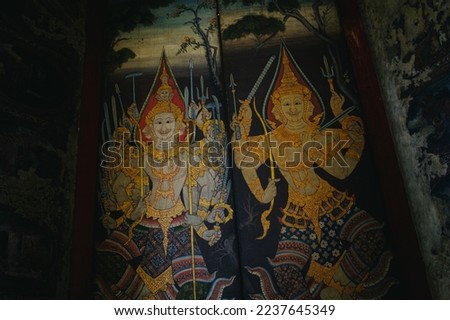 The drawing of angel on the door in the temple in Was Suthat in Bangkok city