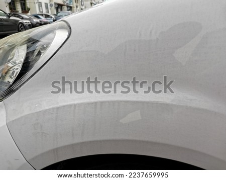 Dirty Watermark On A White Colour Vehicle 