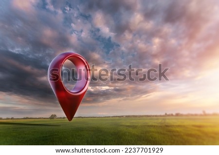 Green field and sunset with destination big red pin location. Concept of goal, dream, end, picnic, victory. mixed media Royalty-Free Stock Photo #2237701929