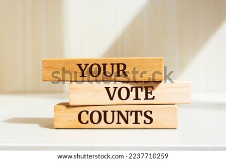 Wooden blocks with words 'Your Vote Counts'.