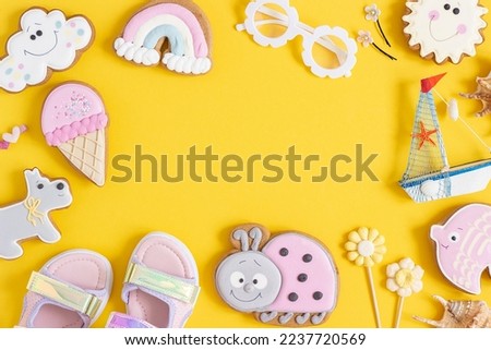 Bright creative layout made of cute summer symbols with copy space on yellow background. Top view, Flat lay. Creative summer concept.