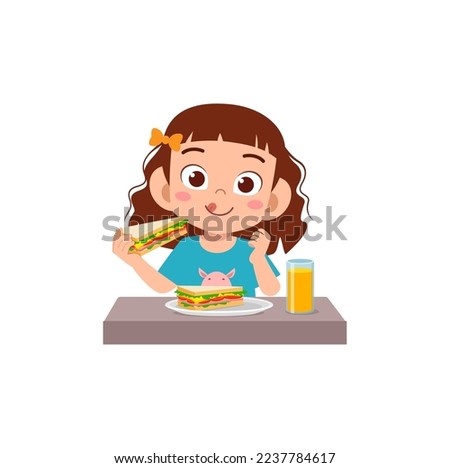 little kid eating sandwich and feel happy Royalty-Free Stock Photo #2237784617