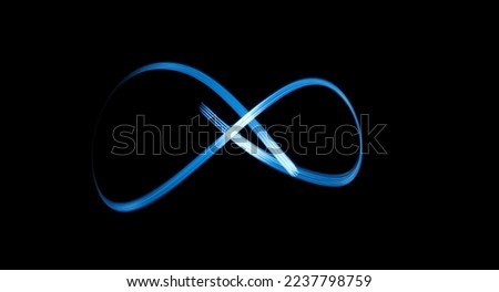 Infinity sign, drawing by light, flash of light in infinity. Royalty-Free Stock Photo #2237798759