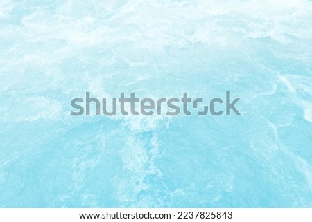 Defocus blurred transparent white colored clear calm water surface texture with splashes and bubbles. Trendy abstract nature background. Water waves in sunlight with copy space. White water shinning 