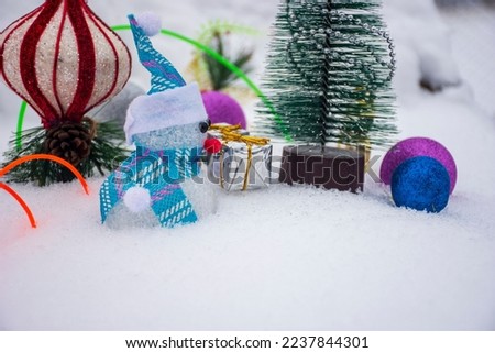 New year and Christmas decoration- Merry Christmas and happy New Year greeting card with copy-space. Snowman with Christmas decoration... Merry Christmas...