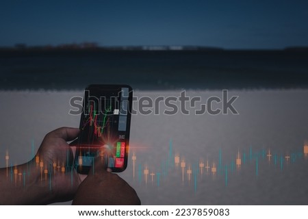 planning and strategy, Stock market, Business growth, progress or success concept. Businessman is trading with smartphone on blurred beach background.trading everywhere concept.