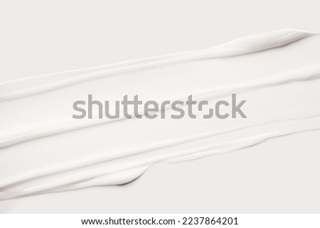 White cosmetic cream balm or mask conditioner isolated on gray background Royalty-Free Stock Photo #2237864201