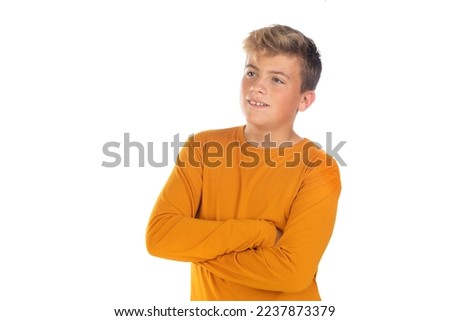Teenager in orange t-shirt on a white background 