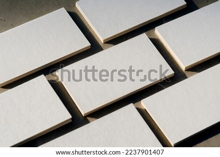 Blank business cards template on a concrete background 