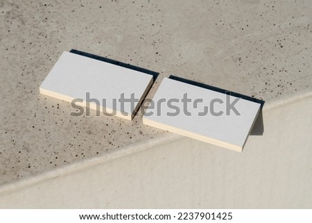 Blank business cards template on a concrete background 