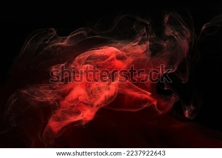 Red black ink abstract background. Acrylic paint backdrop for perfume, hookah, cosmetics. Mysterious smoke clouds, colorful fog