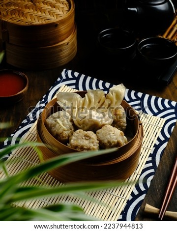 Dimsum is a food product made from a mixture of chicken, shrimp, tapioca flour, and several seasonings as a complement as well as a taste for dimsum dumplings.