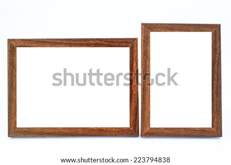 Modern wooden photo frame in white background.