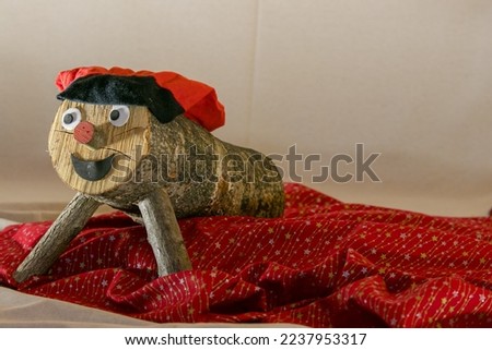 The tió de Nadal (term in Catalan, translatable as "Christmas trunk") is an element of the Catalan and Aragonese custom, and a Christmas tradition established especially in Catalonia and Aragon Royalty-Free Stock Photo #2237953317