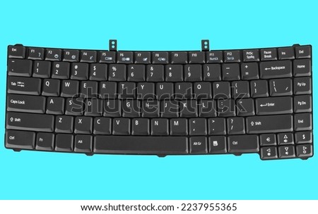 laptop keyboard, on a blue background
