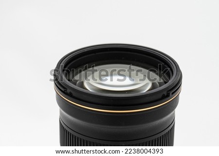Front glass element of a large photographic lens.