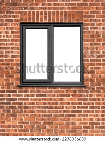 Small window set in a brick wall with white space added within the frame.